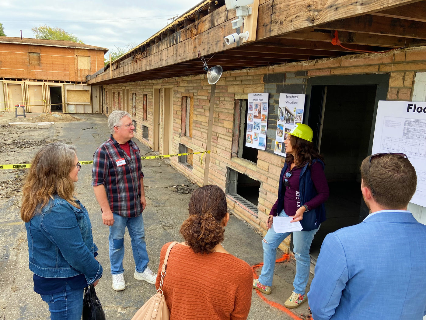 Guests take the opportunity to ask questions about the renovation and project timelines