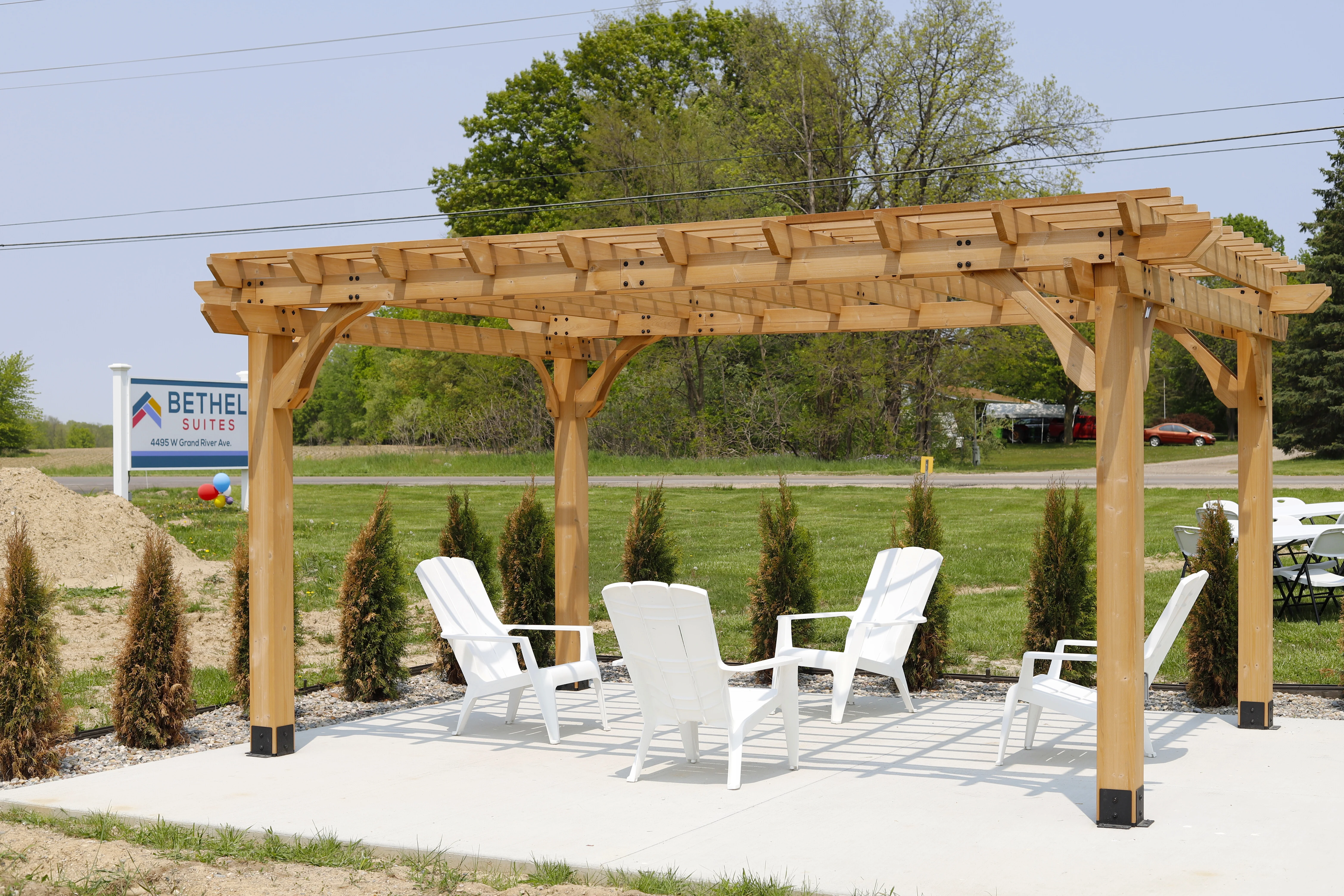 The pergola and gathering patio outside Bethel Suites